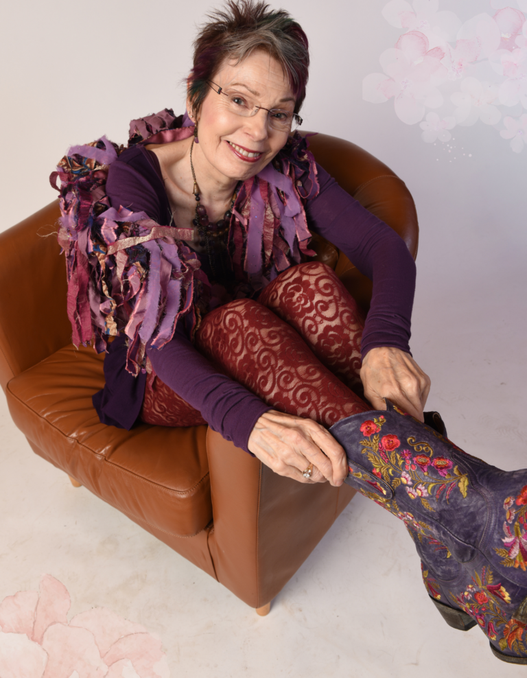 Anne Sagendorph Moon putting on fancy purple boots